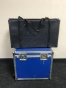 A wedding dress case and a flight case