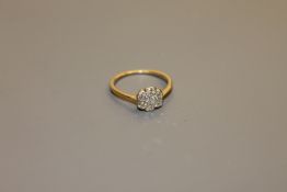 An 18ct gold diamond cluster ring CONDITION REPORT: The ring is in good condition.