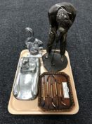 A tray of figure of a golfer, antique golf club wall plaque,