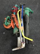 A quantity of garden tools, spirit level, strimmer,