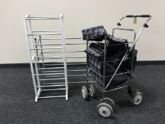 A shopping trolley and two shoe racks