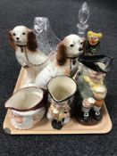 A tray of two Doulton toby jugs, crystal basket and decanter, pair of dog figures,