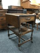 An oak drop leaf trolley