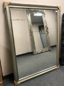 A contemporary framed mirror,