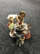 Two Goebel figures - handy man & girl,
