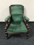 A Victorian mahogany armchair in green fabric CONDITION REPORT: Frame with typical