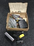 A box of Hornby and Triang rolling stock and track
