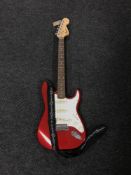 A Squire Strat electric guitar