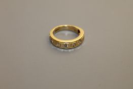 18ct half eternity ring with eight stones 5.