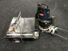 A Ryobi router, tile cutter and a box of bench grinder,
