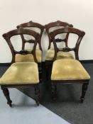 Four antique mahogany dining chairs