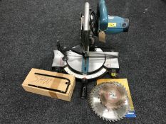 A Makita MLS100 compound saw