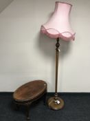 A mahogany coffee table and an oak standard lamp and shade