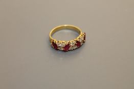 An 18ct gold ruby and diamond ring