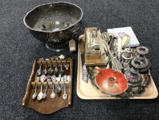 A plated punch bowl with lion mask handles, a collection of teaspoons, plated ware,