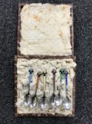 A set of six cased silver and enamelled Art Deco style tea spoons