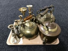 A tray of vintage brass and copper kettles, brass candle holders,
