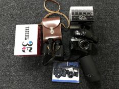 A basket of Yashica FR camera, Yashica 35 Model M camera, lens,