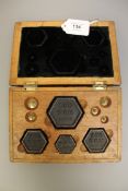 A cased set of Avery weights (9)