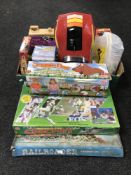A large quantity of toys and board games - Monopoly, Rail Roader, Torpedo Run,