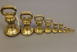 A 19th century graduated set of ten brass weights by Parnall & Sons Ltd of Swansea,