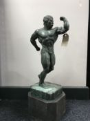 A bronze figure - Body Builder, on marble socle, height 54 cm.