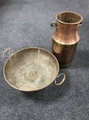 A domed twin handled bowl and a copper and brass churn