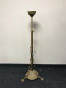 A brass telescopic Art Nouveau lamp stand