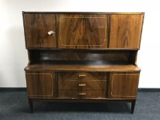 A mid 20th century walnut cocktail sideboard