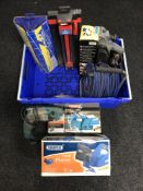 A box of power tools, extension leads, tile cutters, boxed bench vice,