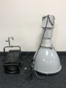 A large industrial halogen lamp and a disco light