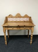 A contemporary pine tiled backed washstand