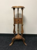 A mahogany wig stand fitted two drawers