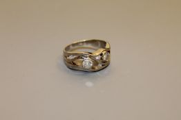An 18ct gold six stone diamond ring, the total diamond weight estimated at 1.
