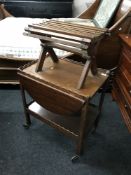 A mahogany two tier trolley and an oak luggage stand