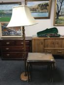 A nest of two tables with gilt-metal mounts and a standard lamp