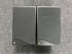 A pair of good quality Kef Coda speakers .