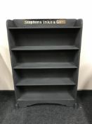 A set of painted open shelves 