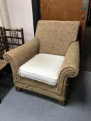 A wicker conservatory armchair