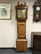A 19th century inlaid oak long cased clock with brass dial, height 206 cm.