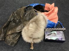 A bag of vintage clothing including furs, lady's shoes,