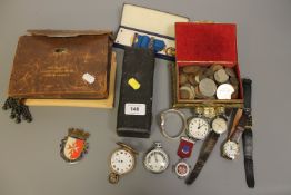 A box containing Ingersoll Triumph pocket watch, Roamer wristwatch, other watches,