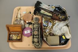 A tray of assorted costume jewellery, hand fans,