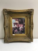 An ornate gilt framed panel depicting a farrier