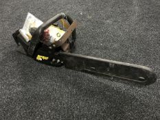 A Mcculloch electric chain saw with manual and spare chain