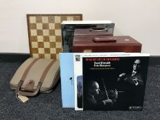 A case of LP records, vintage typewriter, chess board, bathroom cabinet,