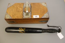 A Victorian style police truncheon and an oak two-division cigarette box with silver plated mounts