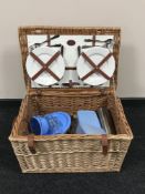 A large wicker Optima picnic basket and contents