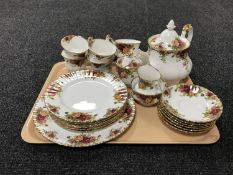 A tray of twenty-three pieces of Royal Albert Old Country Roses china