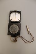 An R.A.F. pilot's military-issue Magnetic Marching Compass Mark 1, serial number B118772, by T.G.Co.
